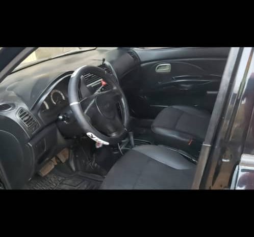 
								2010 Kia Rio full									