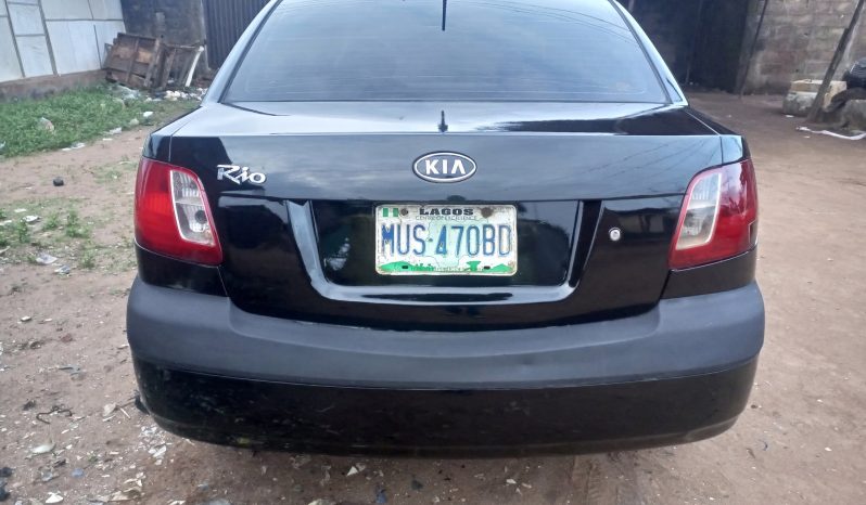 
								2009 Kia Rio full									