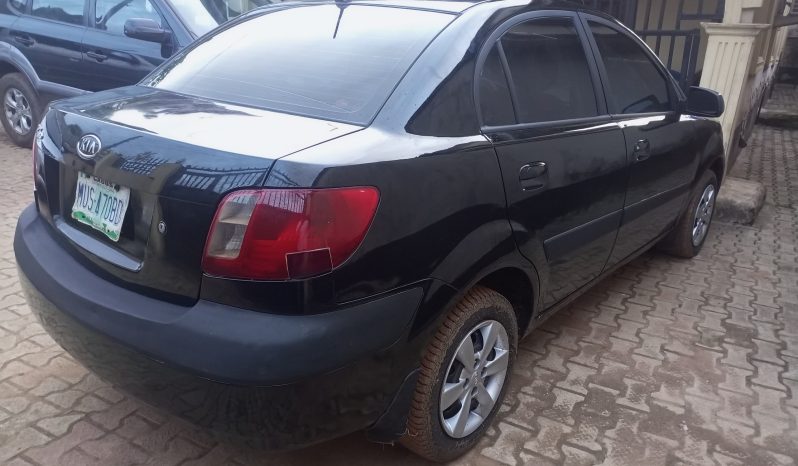 
								2009 Kia Rio full									