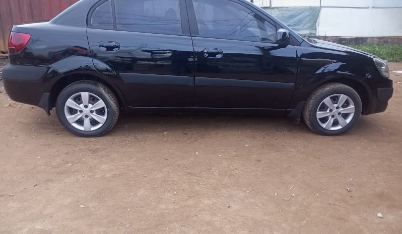 
								2009 Kia Rio full									