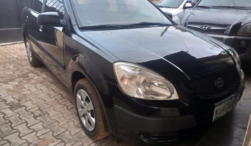 
								2009 Kia Rio full									