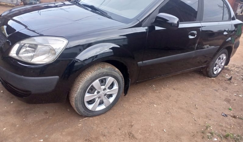 
								2009 Kia Rio full									