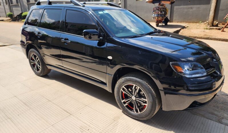 
								2003 Mitsubishi Outlander full									