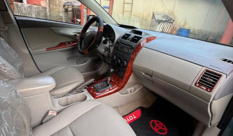 
								2009 Toyota Corolla full									