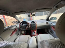 
										2009 Toyota Corolla full									