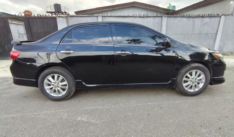 
								2009 Toyota Corolla full									