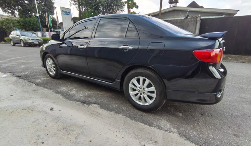 
								2009 Toyota Corolla full									