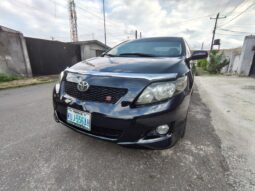 
										2009 Toyota Corolla full									