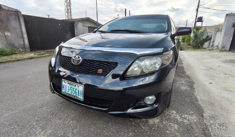 
								2009 Toyota Corolla full									