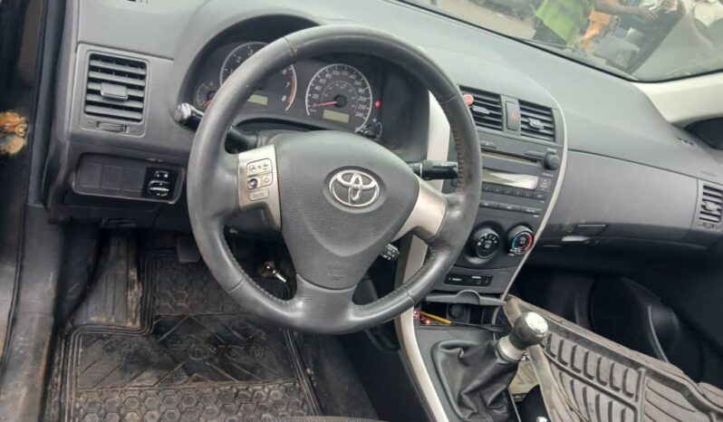 
								2009 Toyota Corolla full									