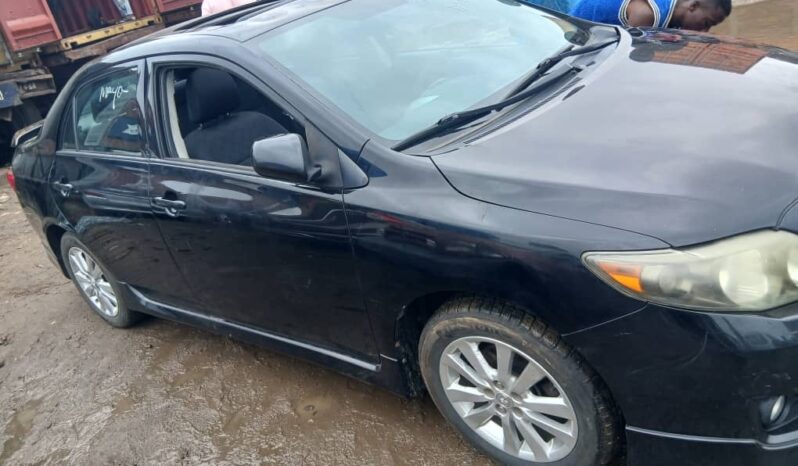 
								2009 Toyota Corolla full									