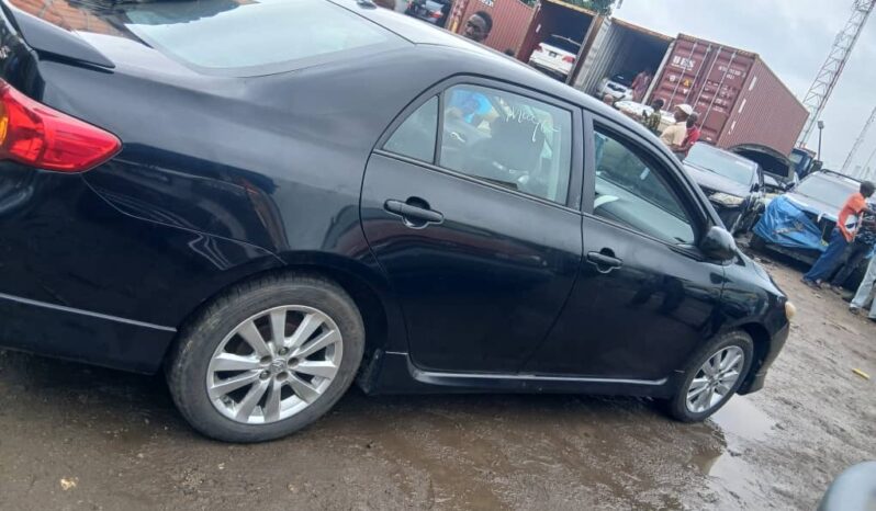 
								2009 Toyota Corolla full									