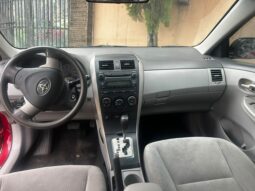 
										2010 Toyota Corolla full									